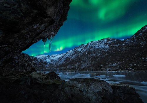 Aurora-seen-from-a-cave-in-Norway